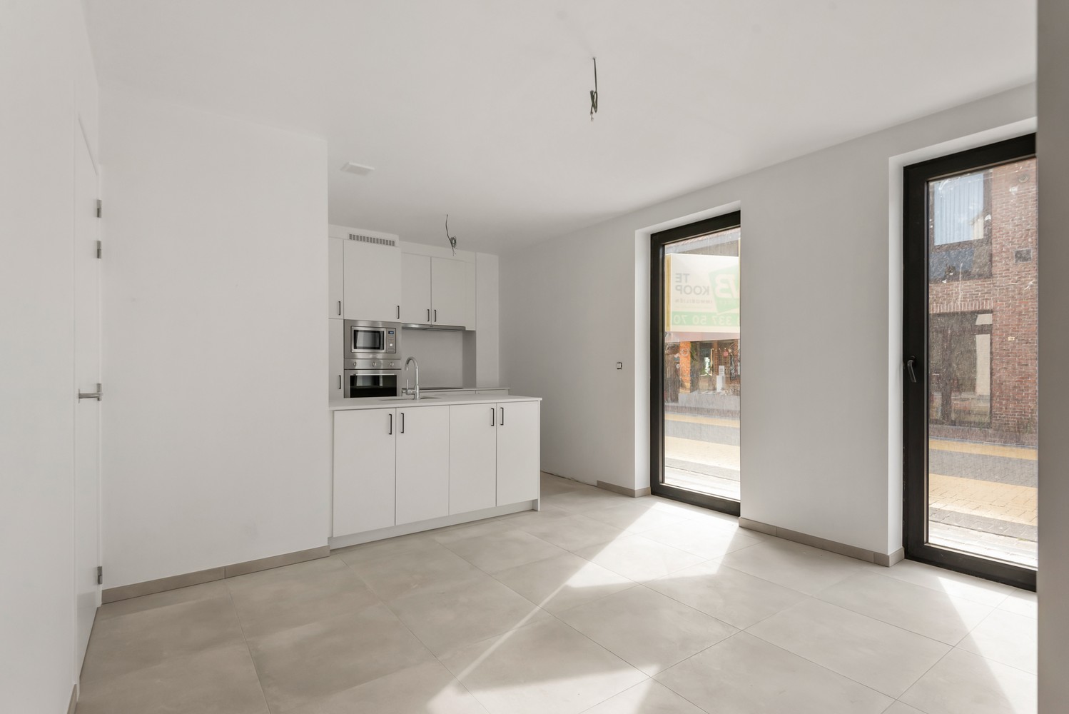 Licht en functioneel appartement (+/-81.5m²) met 2 slaapkamers en een zuidgeoriënteerd terras (+/-7.5m²)! afbeelding 4