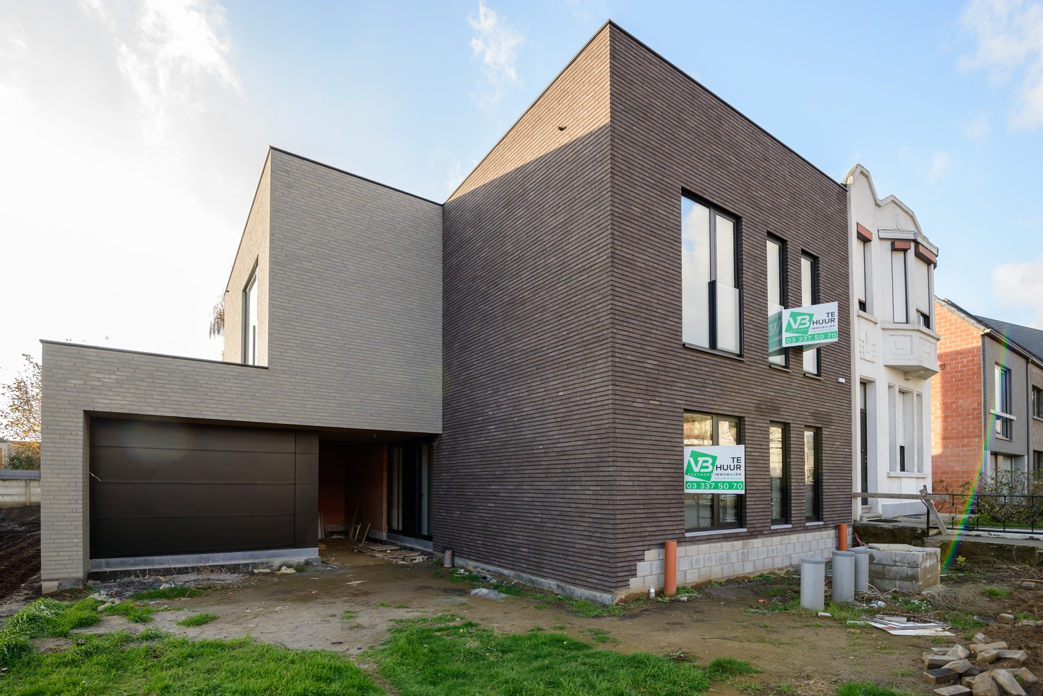 Gloednieuw gelijkvloers appartement met 2 slpk's, tuin & garagebox te Wijnegem. afbeelding 1